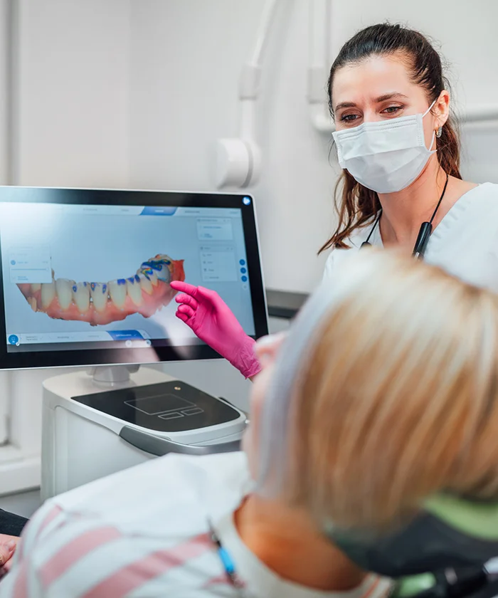 Dentist Explaining Implant Procedure